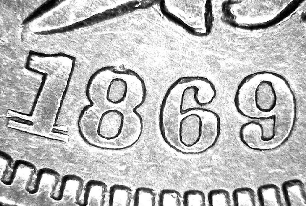 1869 Indian Head penny Snow-2 repunched date variety with die crack visible through the reverse wreath area